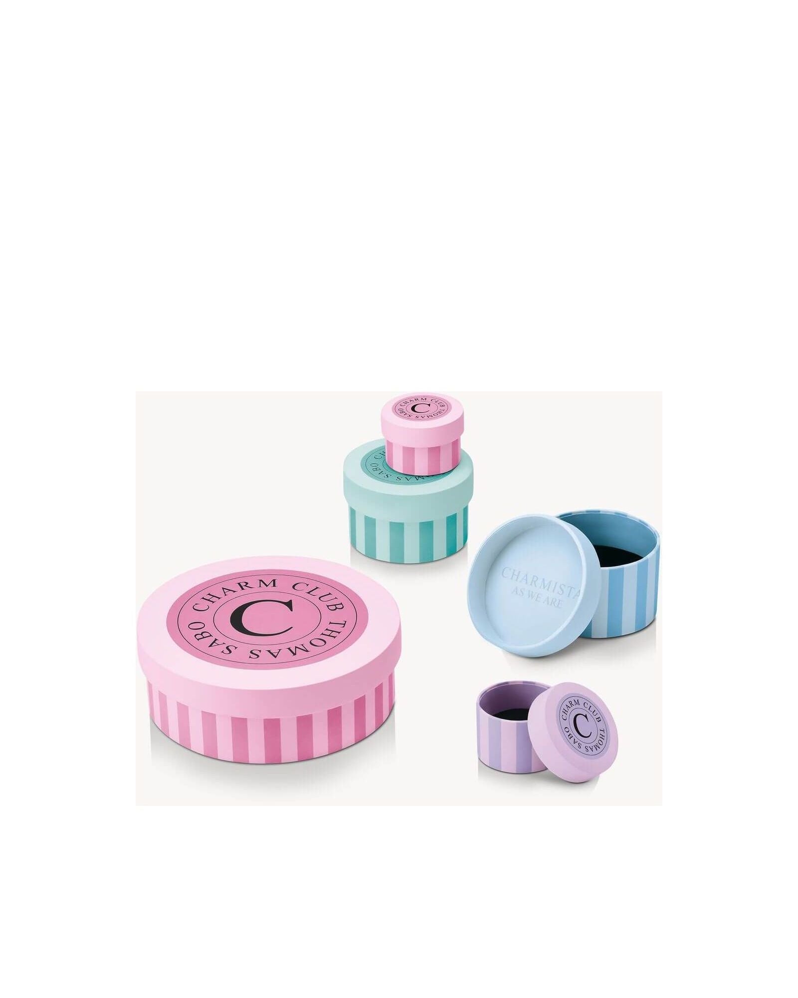 Colorful Thomas Sabo charm club gift boxes in pastel shades, featuring elegant designs and charming logos.