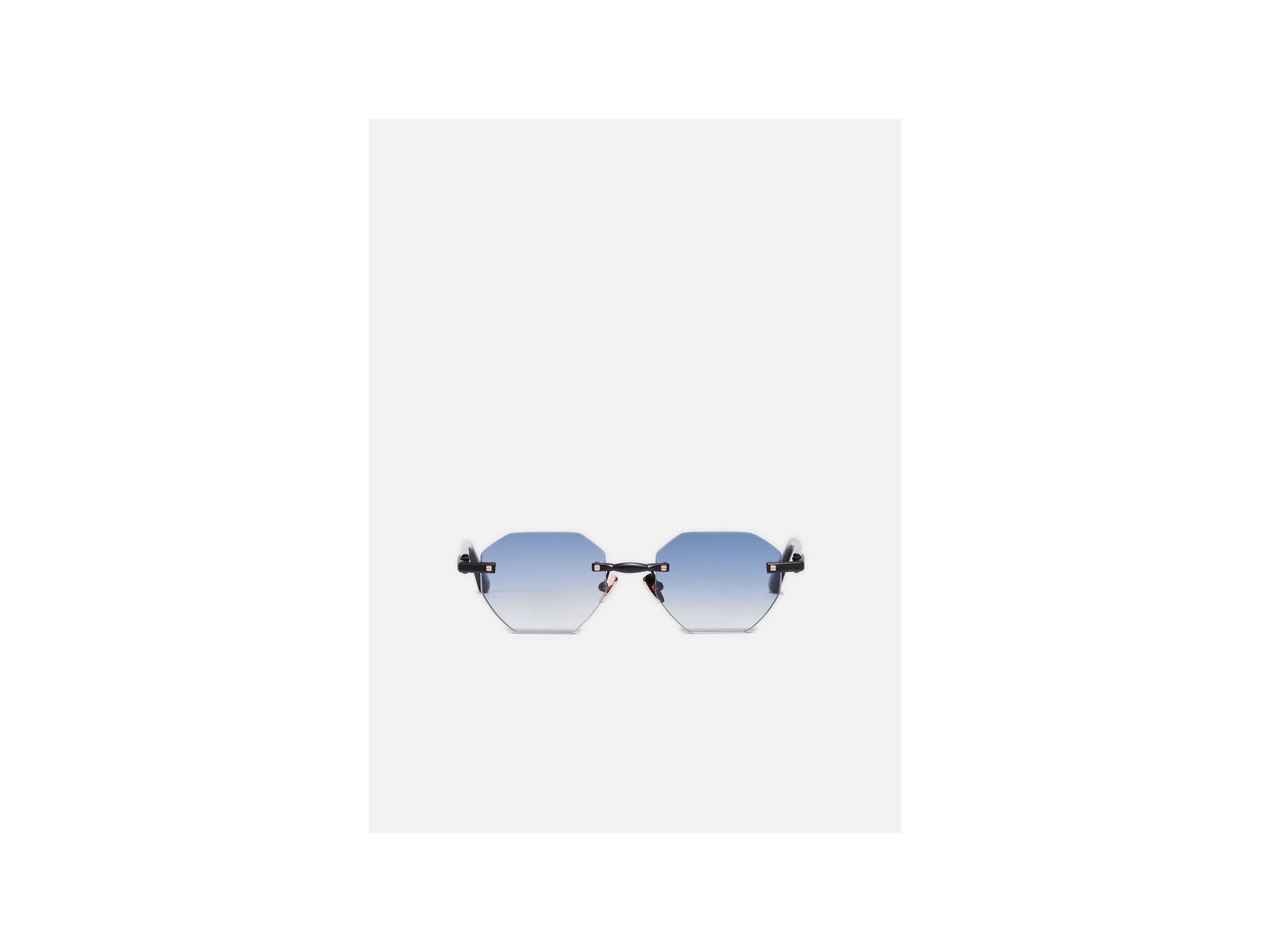 Lunettes de soleil octogonales avec verres dégradés, élégance et protection UV.