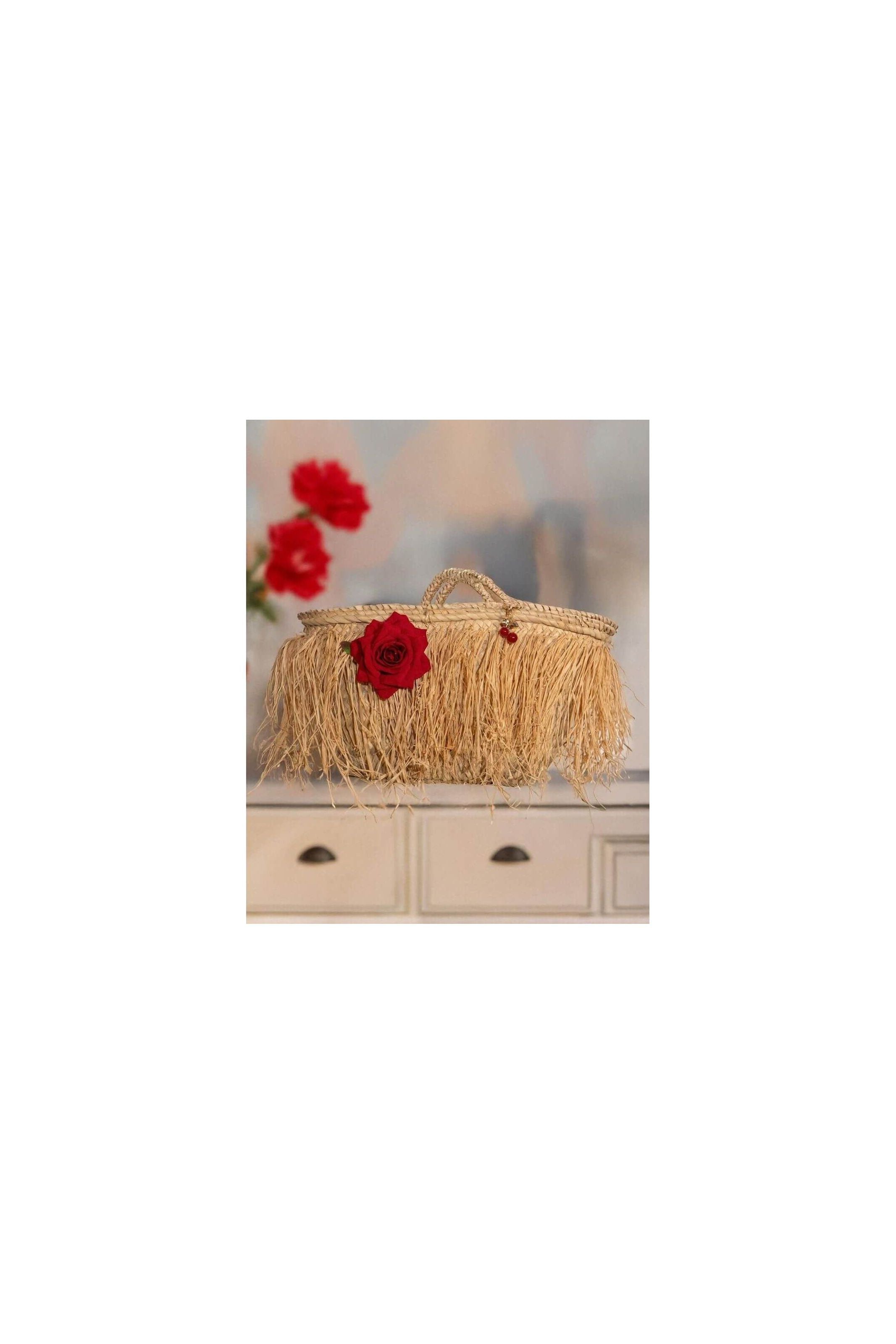 Elegant fringe basket bag with red rose, perfect for summer outings and city days, by Emi S.