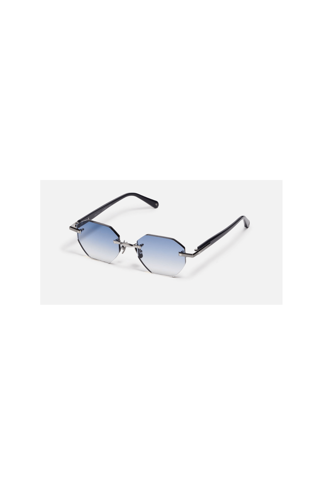 Lunettes de soleil Timothy C522 en métal avec verres dégradés et design contemporain élégant.