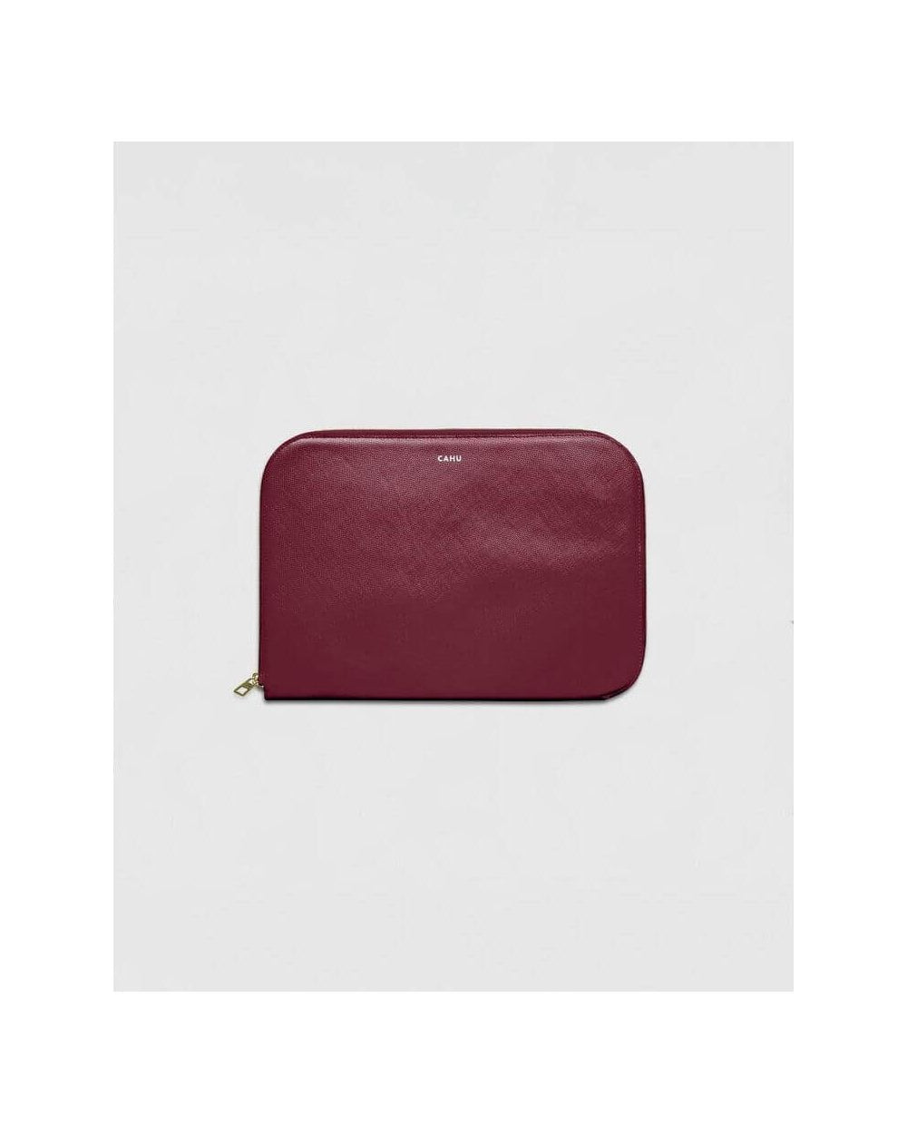 La Pochette Claude, burgundy 13-inch laptop sleeve, premium PVC exterior, cotton lining, gold zipper closure.