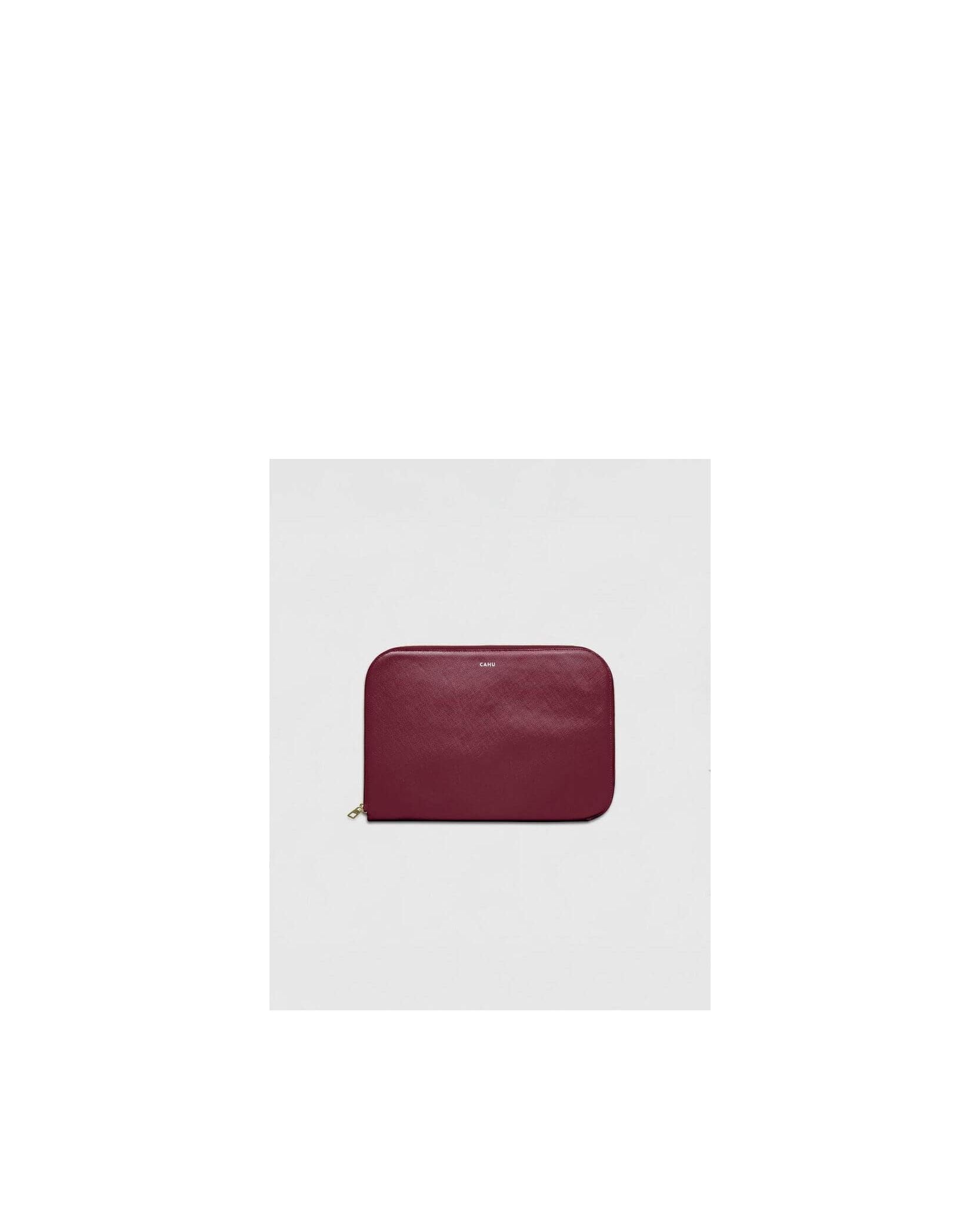 La Pochette Claude, burgundy 13-inch laptop sleeve, premium PVC exterior, cotton lining, gold zipper closure.