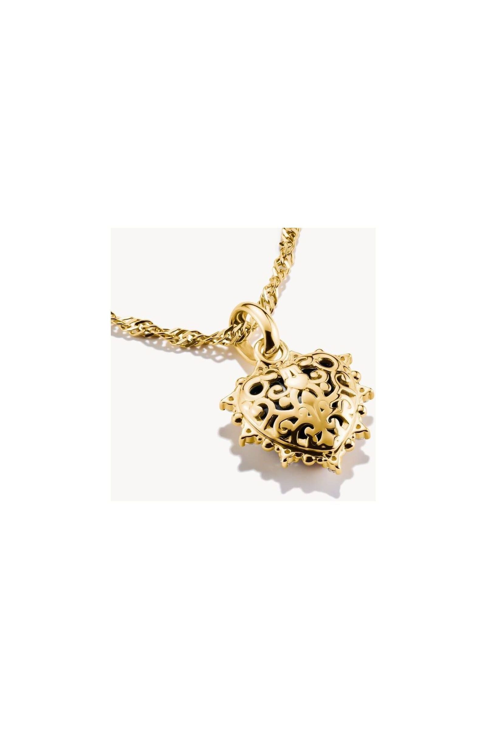 Charm cœur vintage plaqué or, design filigrane avec zirconium noir, bijou élégant à porter des deux côtés.
