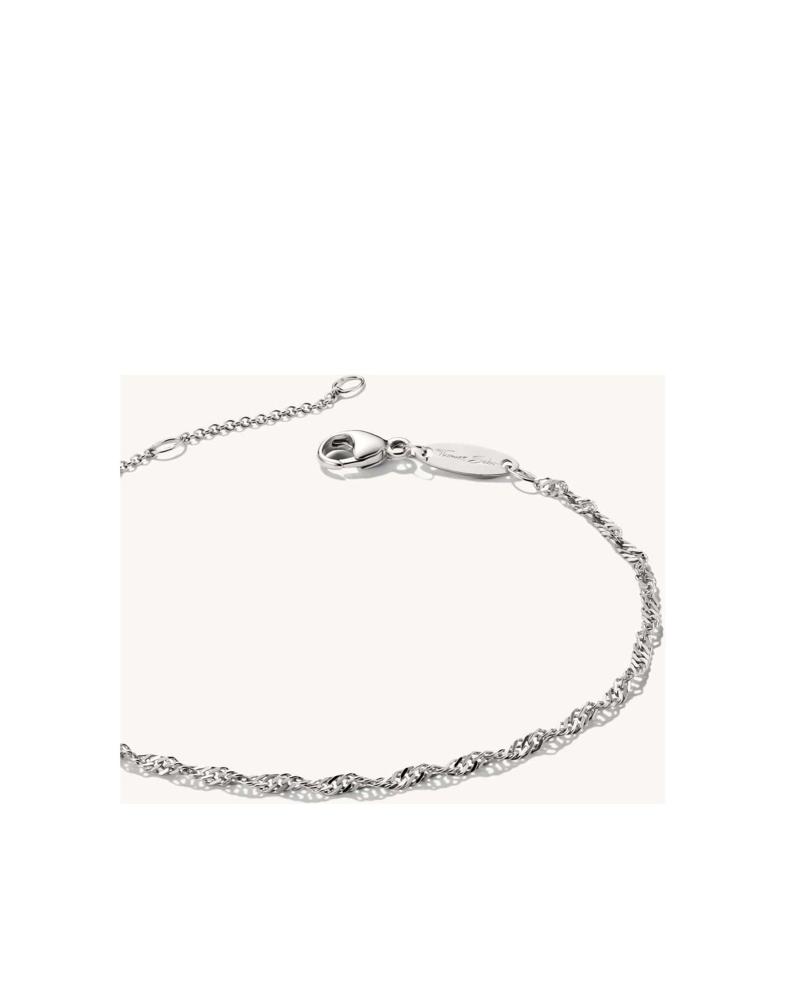 Élégant bracelet charm en argent 925 avec filigrane en spirale, réglable pour un ajustement parfait.