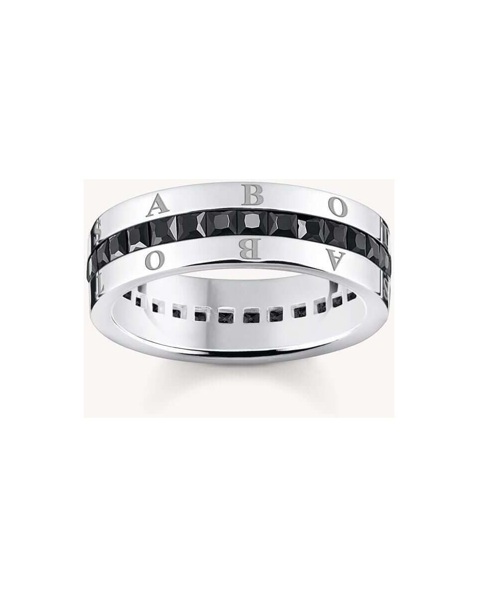 Bague ruban en argent 925 avec zircones noires, gravure élégante, design raffiné et confort optimal.