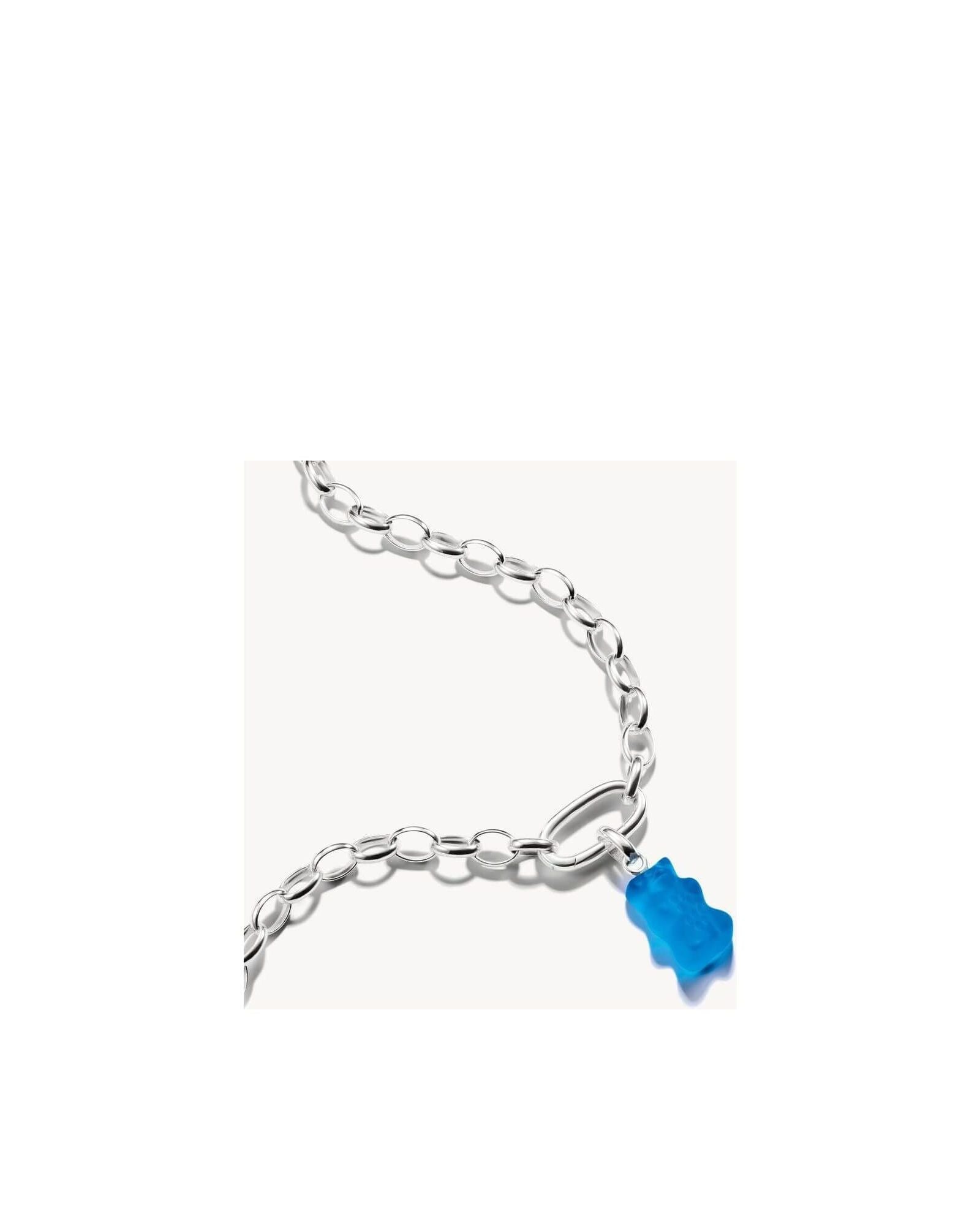 Pendentif charm Ours d'Or en cristal bleu sur chaîne en argent recyclé, élégant et joyeux.