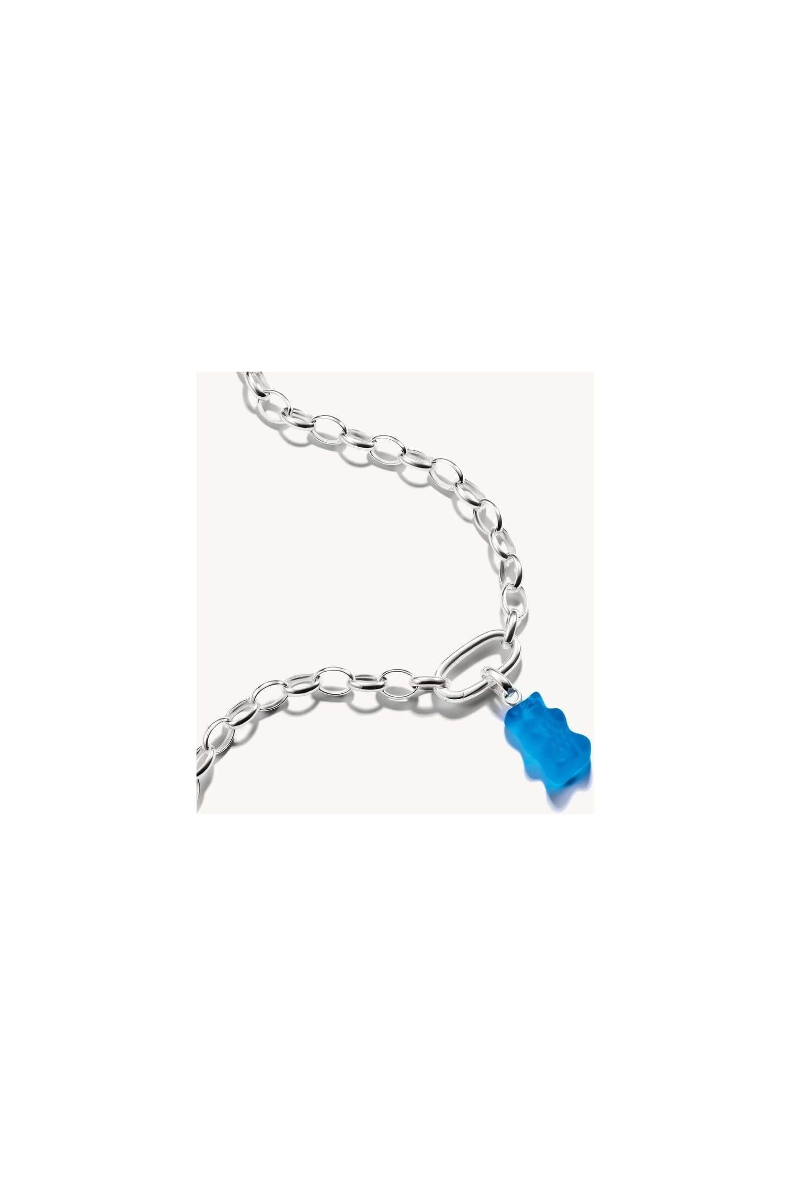 Pendentif charm Ours d'Or en cristal bleu sur chaîne en argent recyclé, élégant et joyeux.