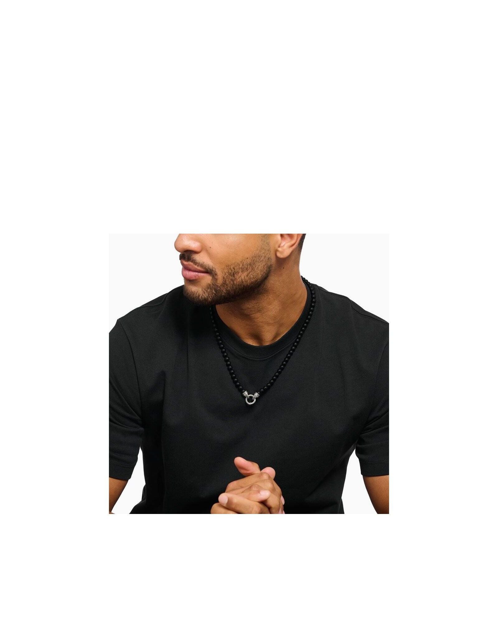 Man wearing a 60 cm black obsidian beads necklace with a decorative silver clasp.
