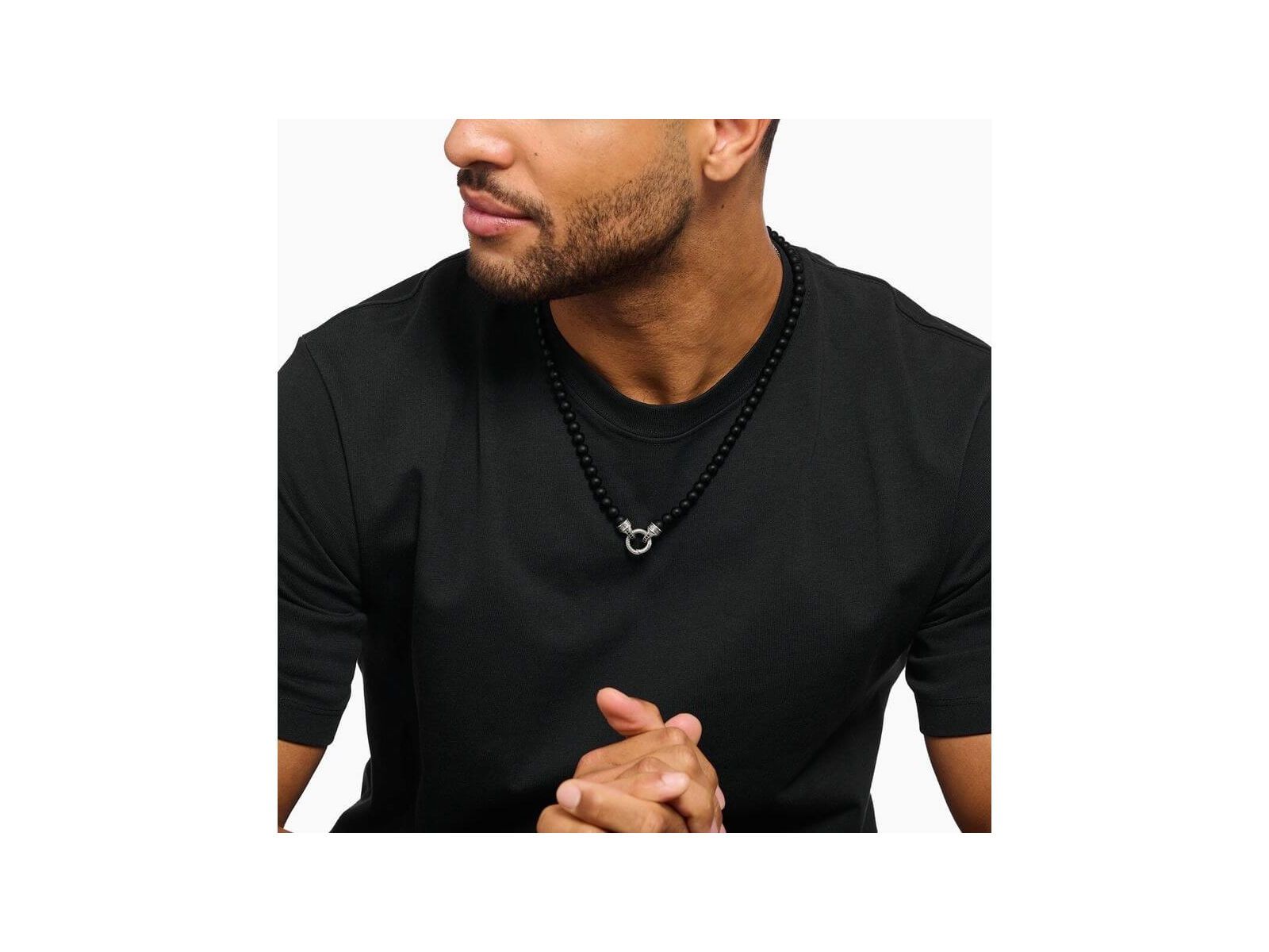 Man wearing a 60 cm black obsidian beads necklace with a decorative silver clasp.