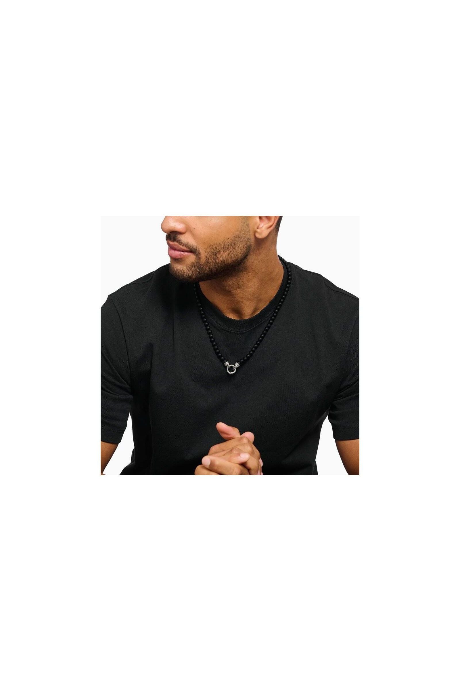Man wearing a 60 cm black obsidian beads necklace with a decorative silver clasp.