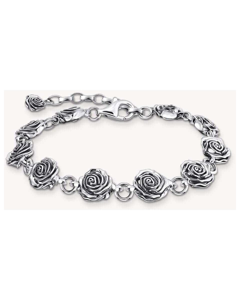 Bracelet Midnight Rose en argent recyclé avec roses tridimensionnelles et œillets flexibles, design élégant.