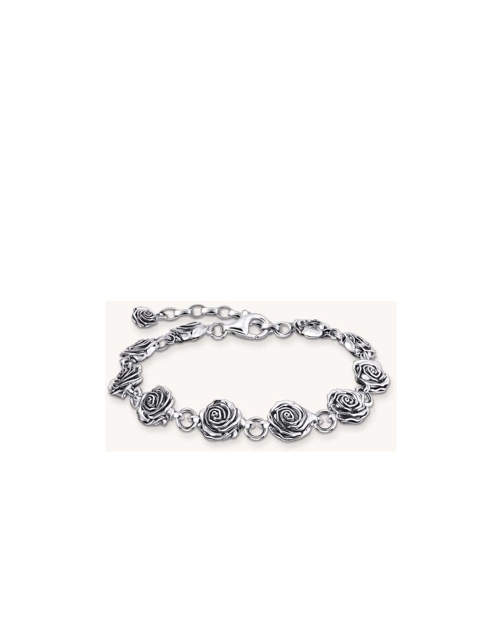 Bracelet Midnight Rose en argent recyclé avec roses tridimensionnelles et œillets flexibles, design élégant.
