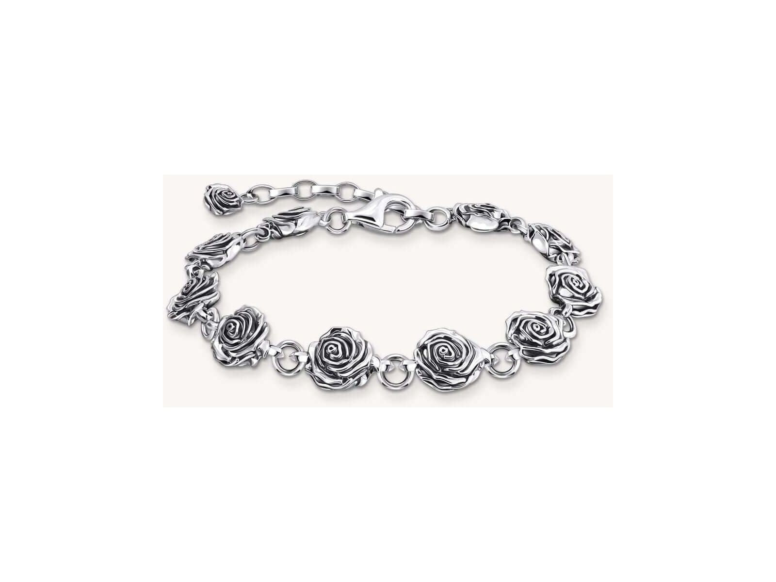 Bracelet Midnight Rose en argent recyclé avec roses tridimensionnelles et œillets flexibles, design élégant.