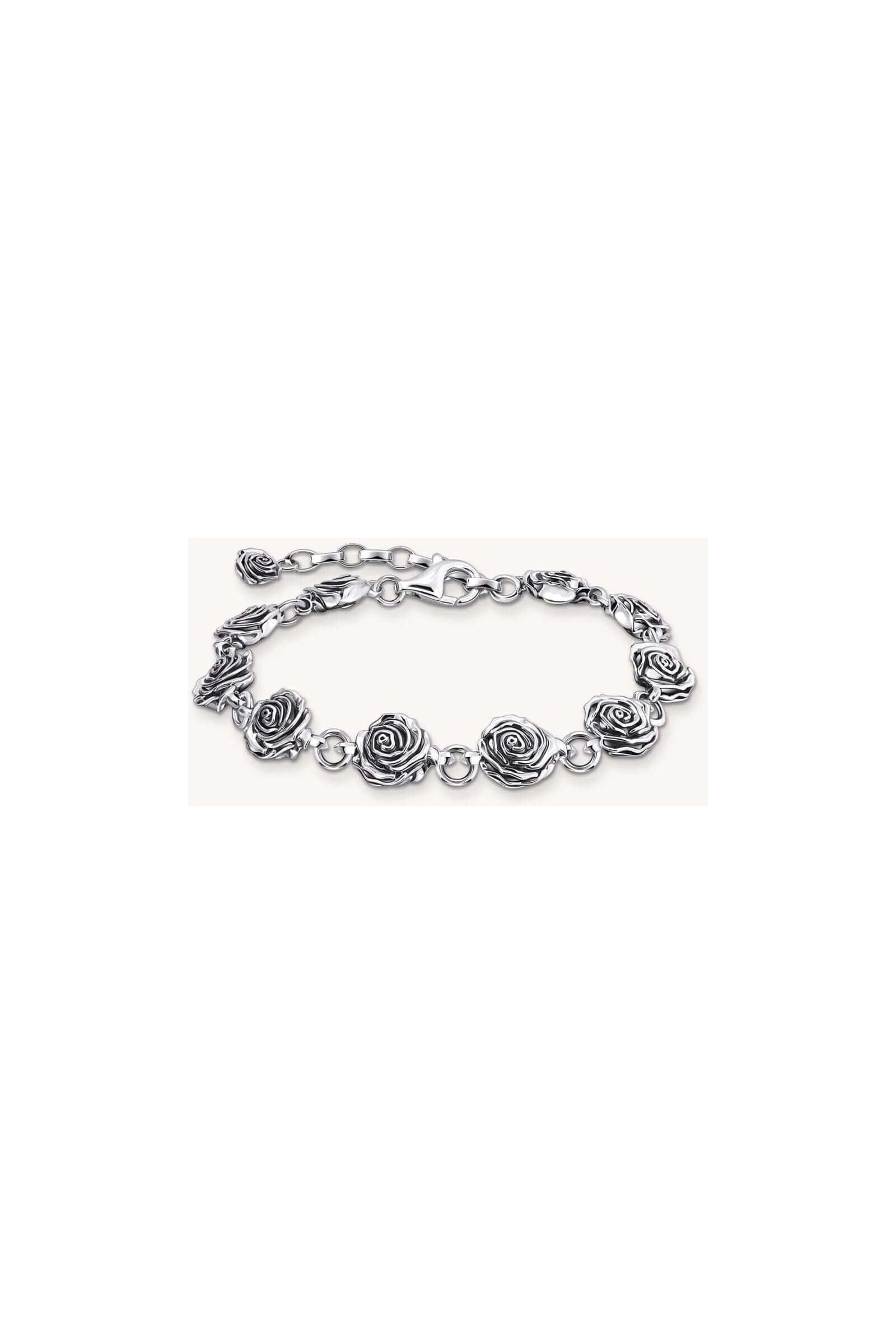 Bracelet Midnight Rose en argent recyclé avec roses tridimensionnelles et œillets flexibles, design élégant.