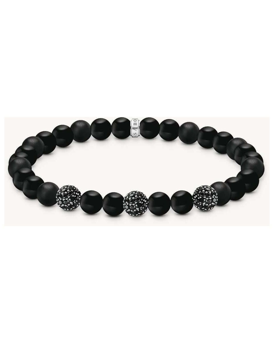 Bracelet en obsidienne mate et polie, ornée de zirconium noir, style rock-chic et élégant.