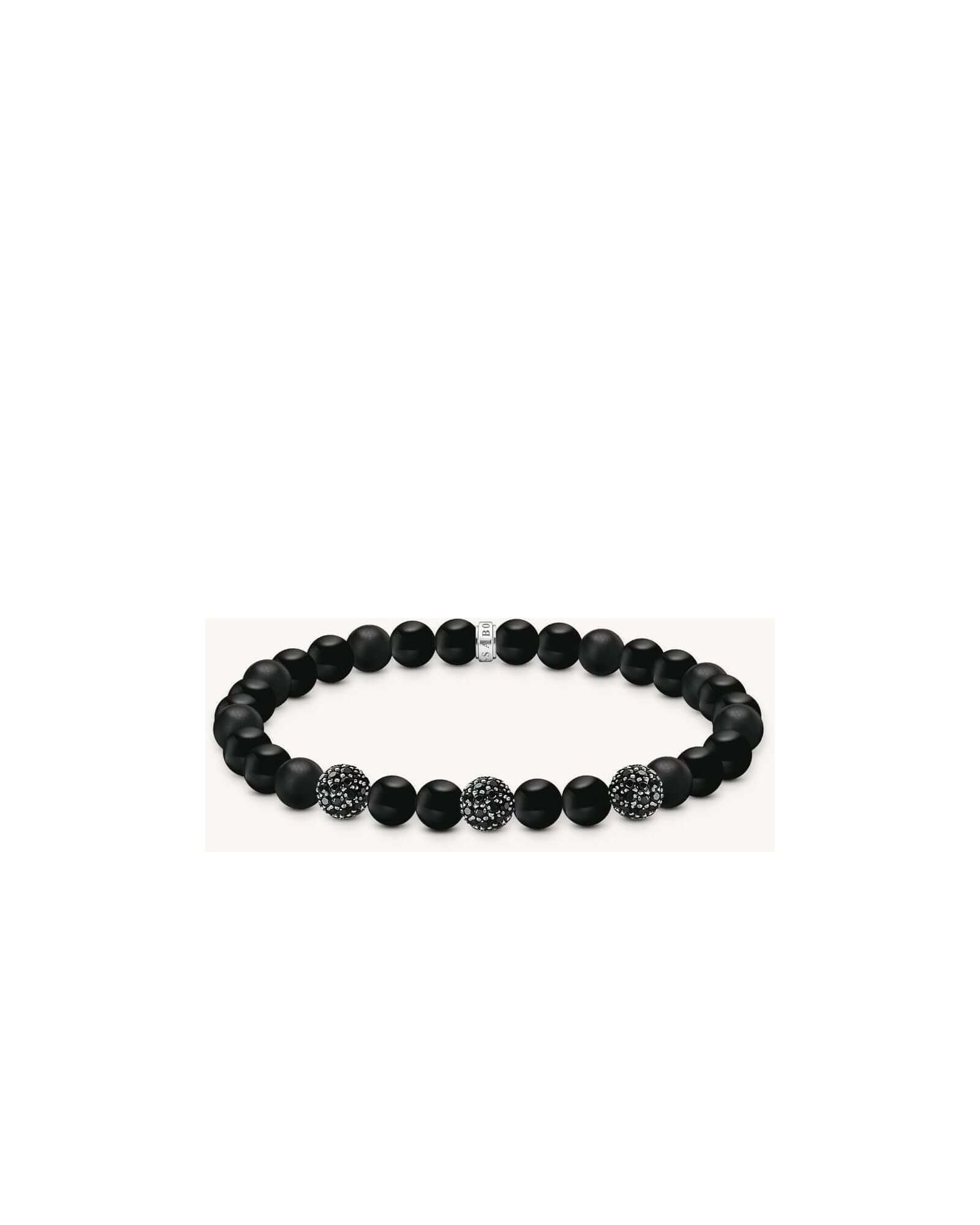 Bracelet en obsidienne mate et polie, ornée de zirconium noir, style rock-chic et élégant.
