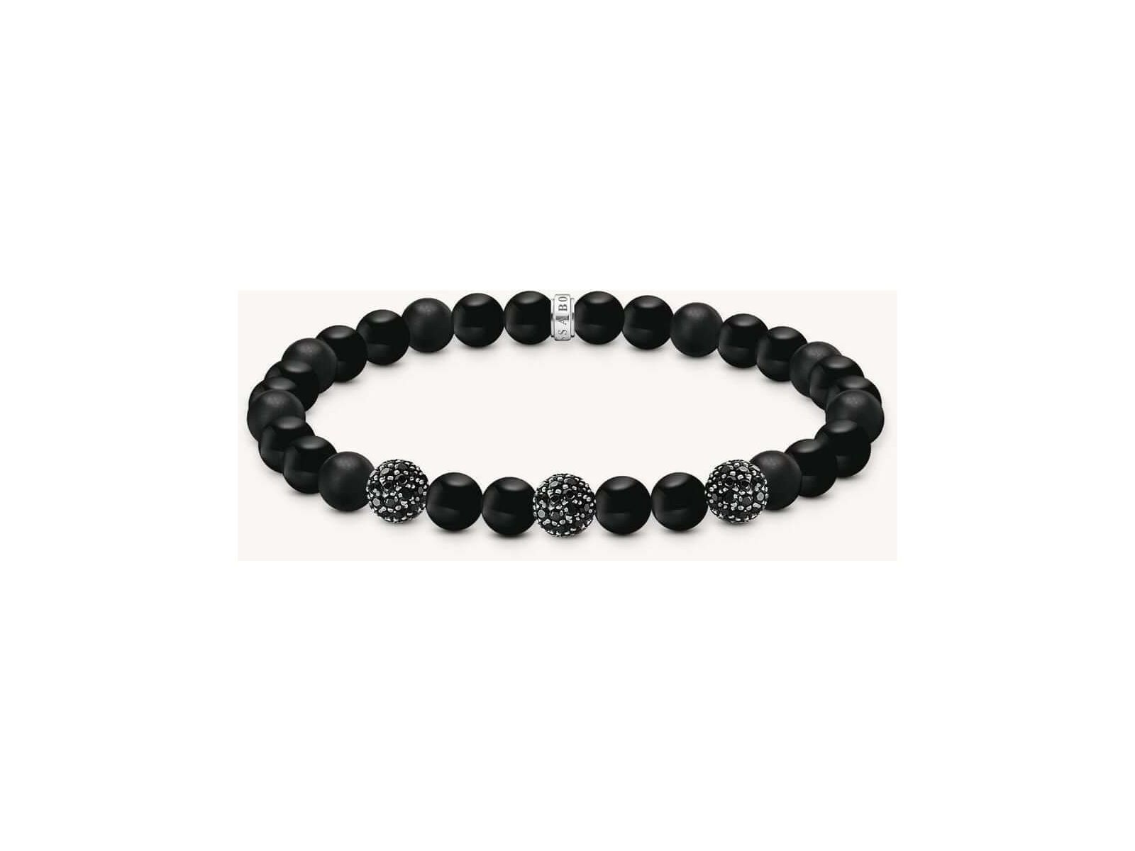 Bracelet en obsidienne mate et polie, ornée de zirconium noir, style rock-chic et élégant.