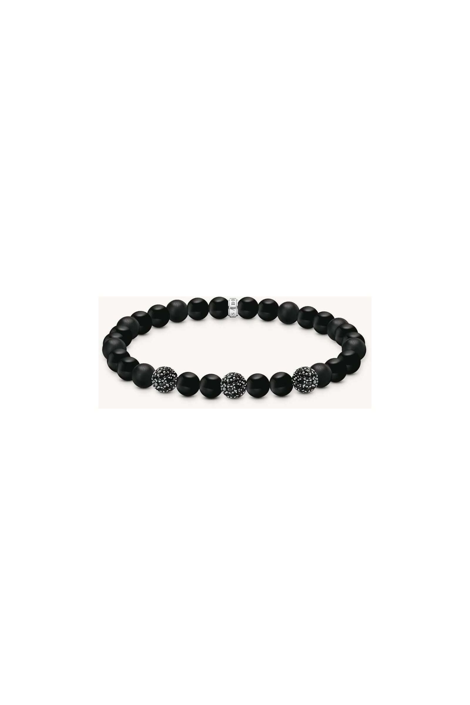 Bracelet en obsidienne mate et polie, ornée de zirconium noir, style rock-chic et élégant.