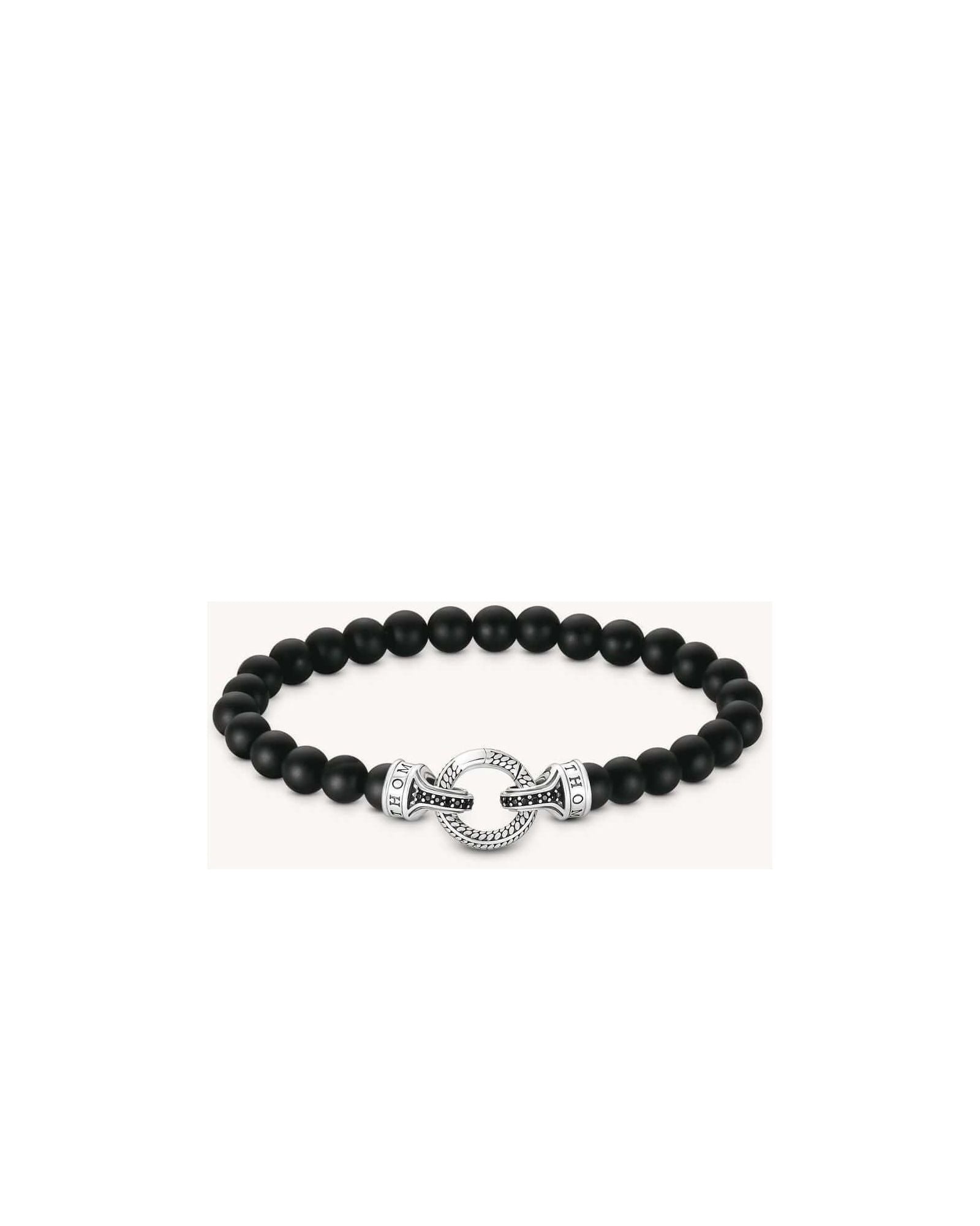 Bracelet en beads d'obsidienne noire mate avec fermoir en argent recyclé et embouts en zirconium noir.