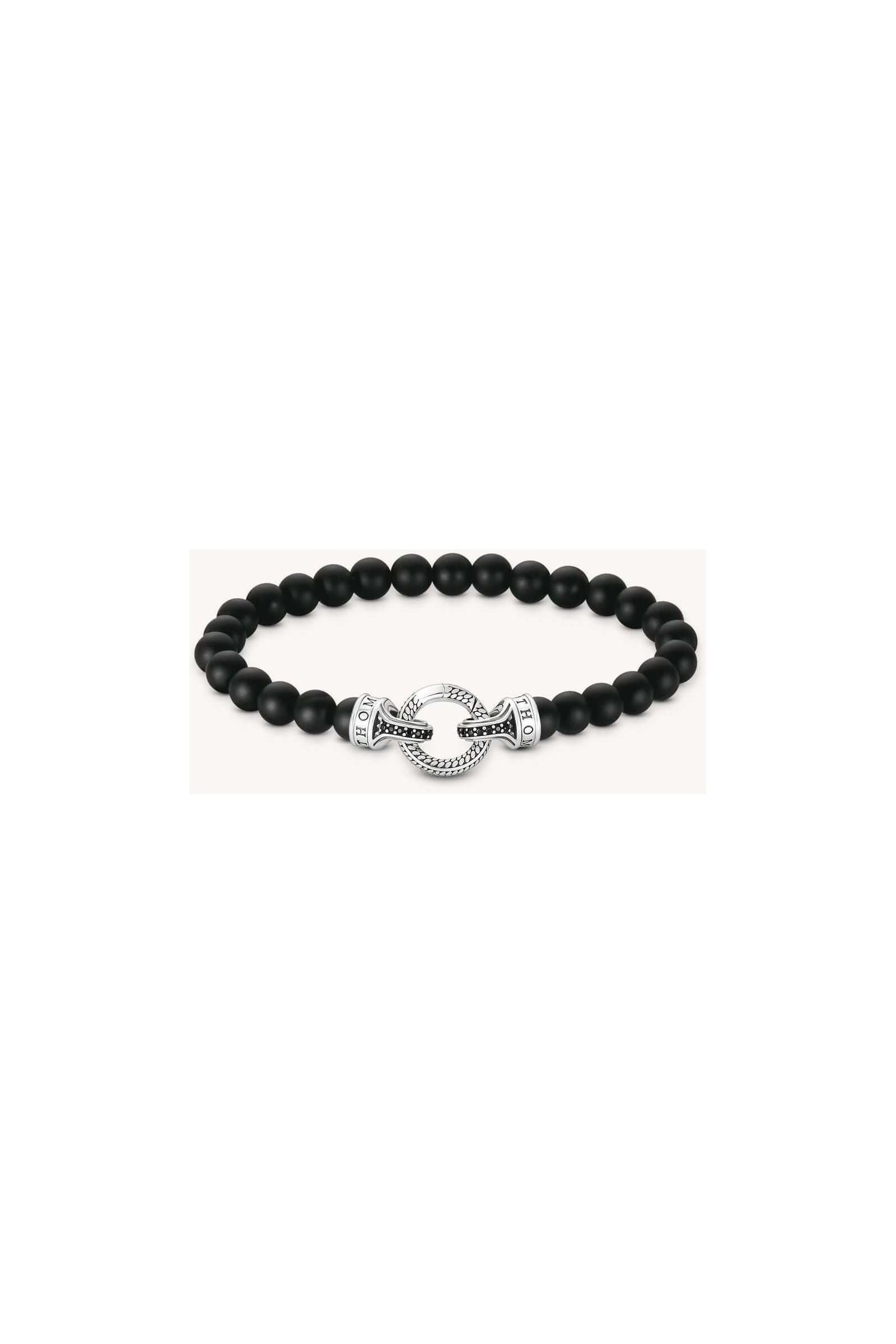Bracelet en beads d'obsidienne noire mate avec fermoir en argent recyclé et embouts en zirconium noir.