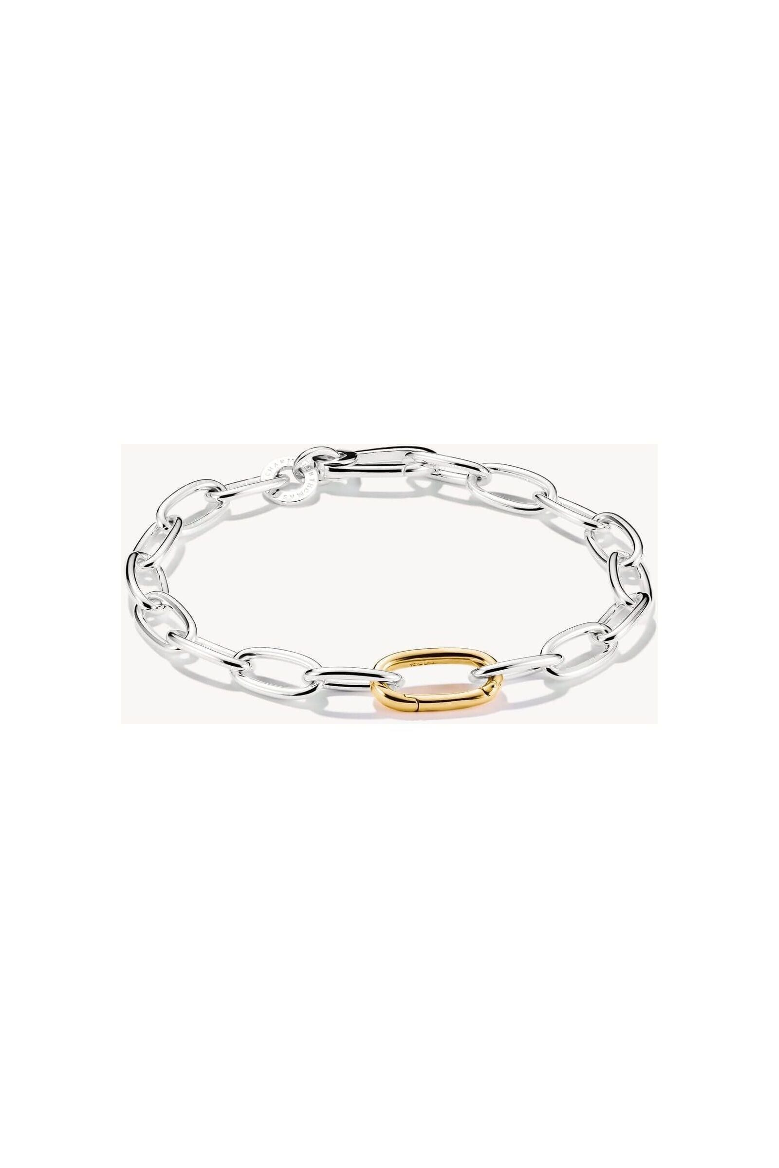 Bracelet charm bicolore en argent 925 avec maillon central doré, design moderne et élégant.
