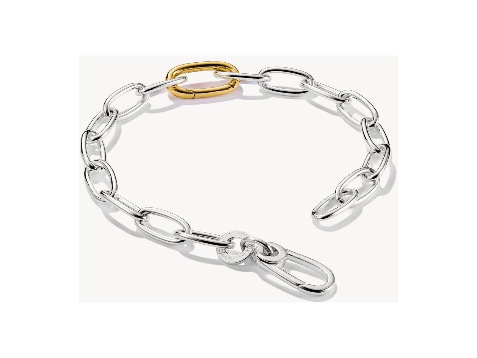 Bracelet charm bicolore en argent recyclé, avec maillon central plaqué or 18k, design moderne.