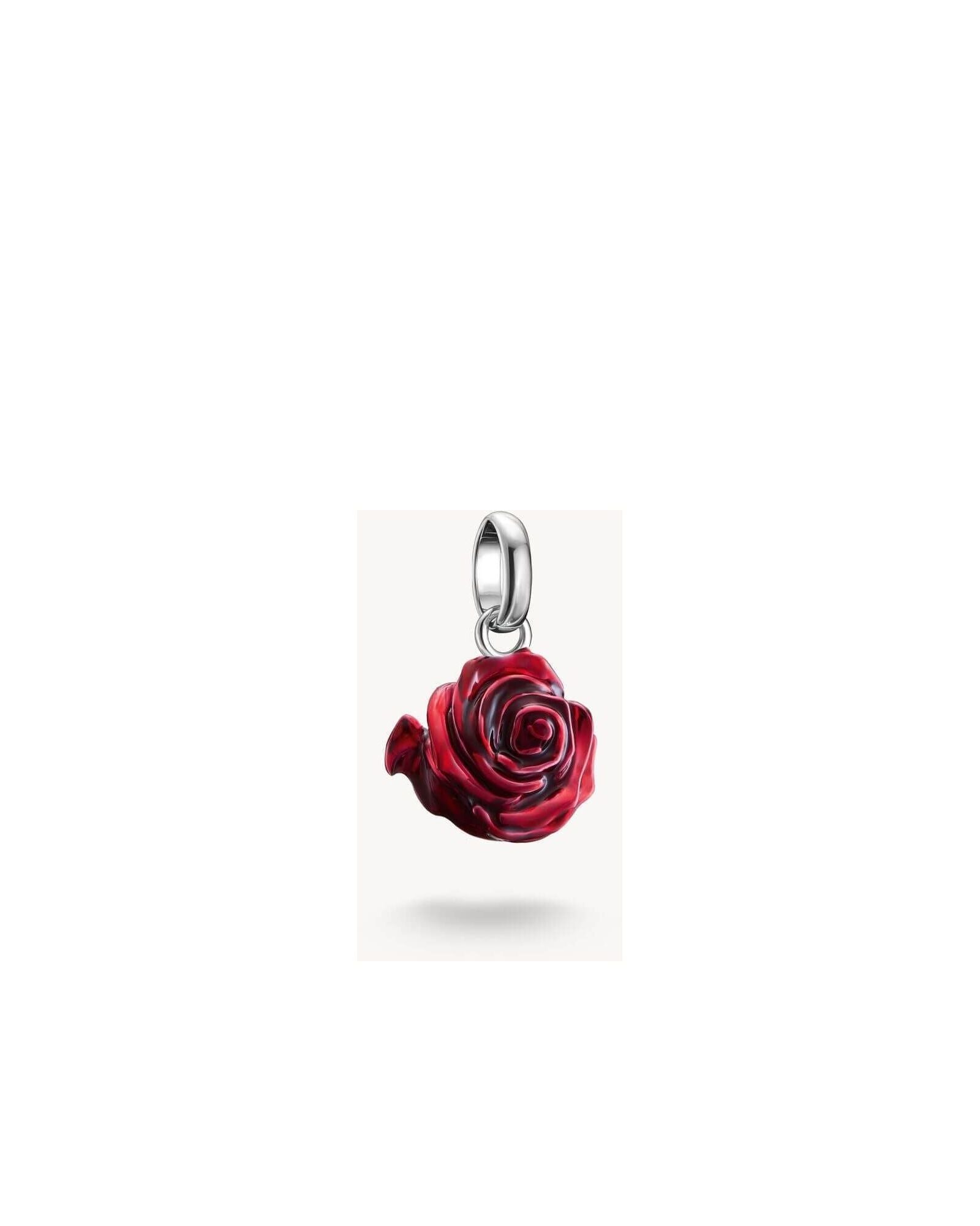 Charm pendant in recycled silver featuring a 3D red rose, detailed with hand-applied red enamel.