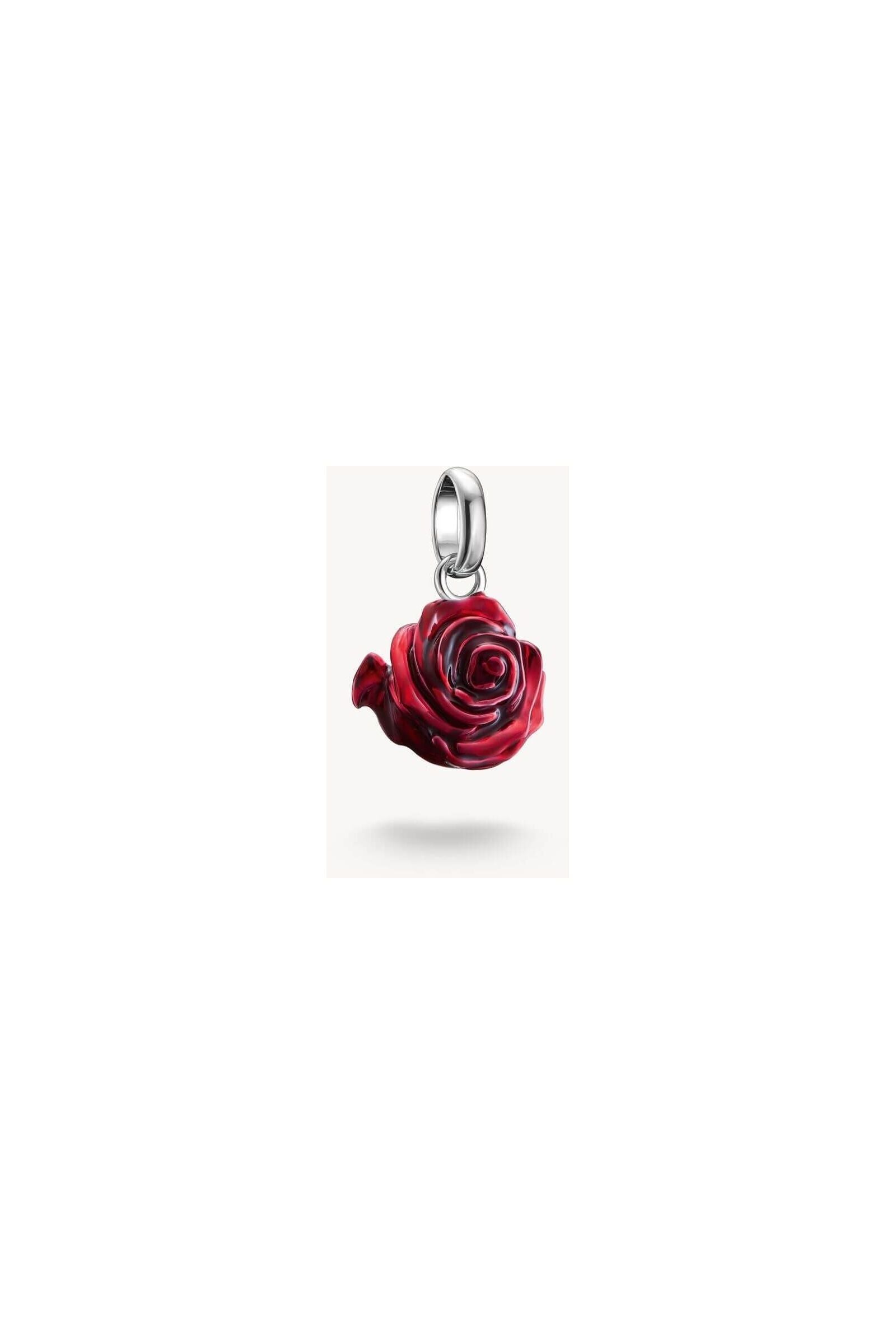 Charm pendant in recycled silver featuring a 3D red rose, detailed with hand-applied red enamel.