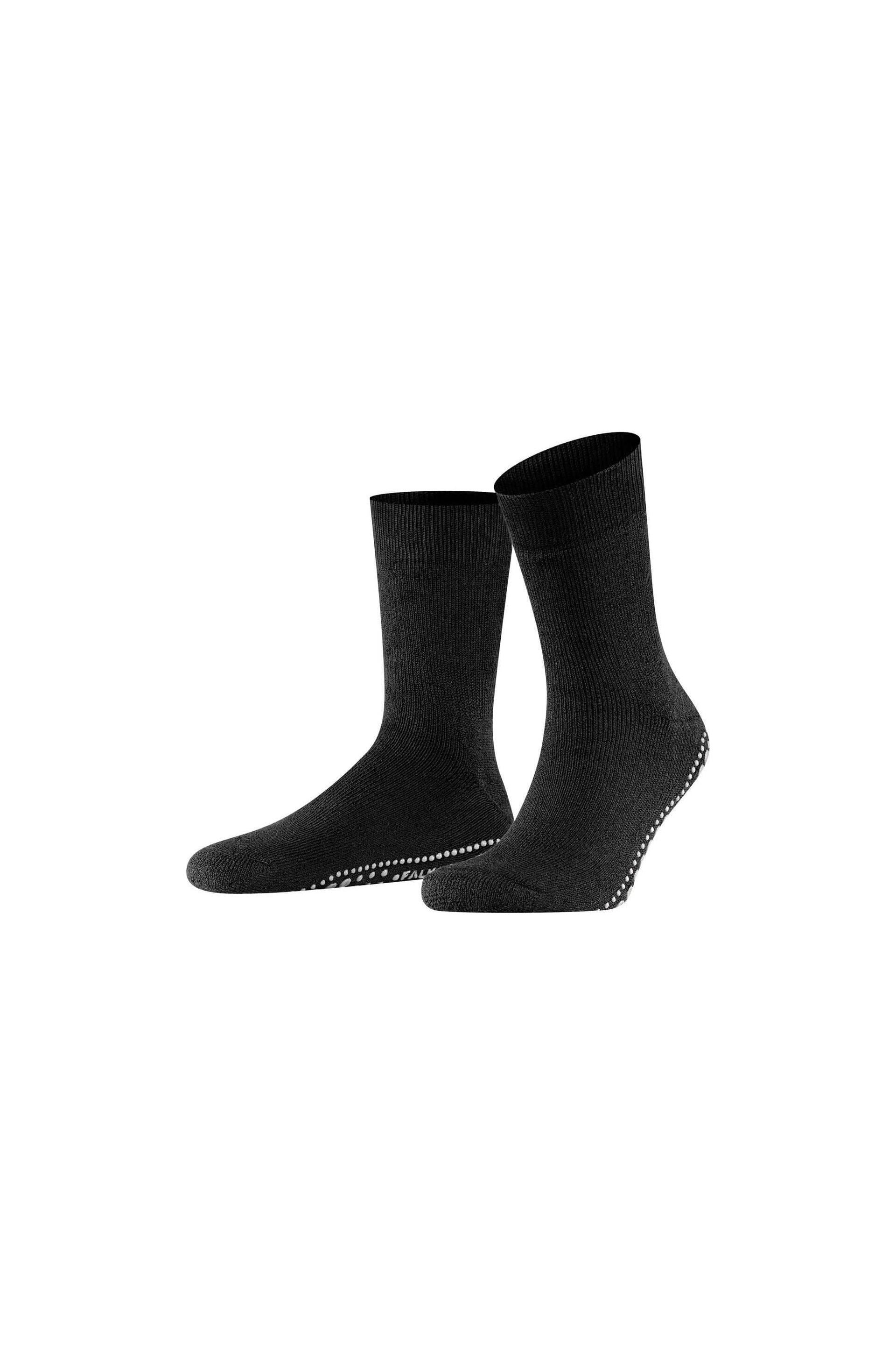 Chaussettes Homepads FALKE noires avec semelle en silicone pour une adhérence sécurisée à la maison.