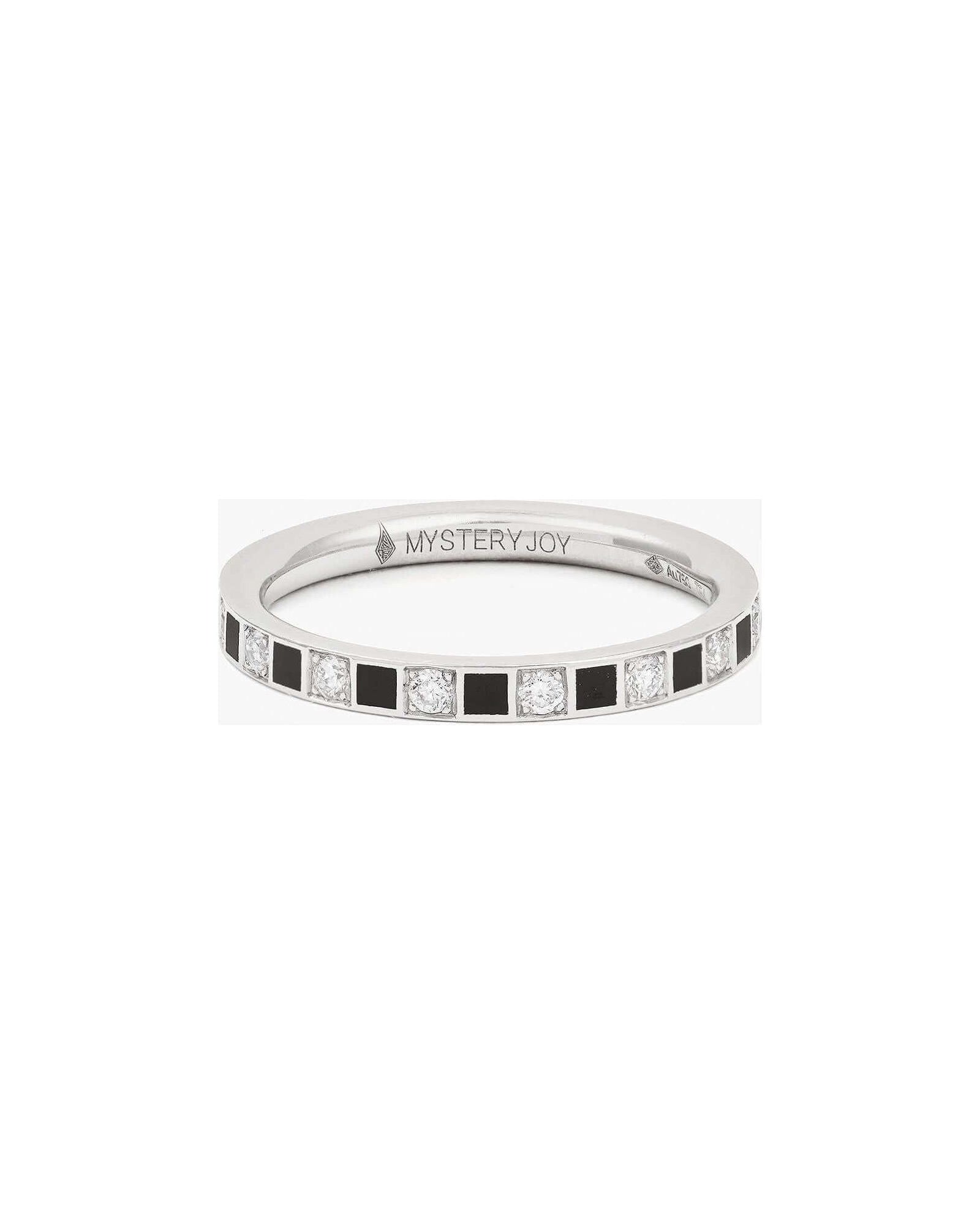 Alliance rêve ring with black and white diamonds, set in a sleek band, showcasing a contemporary design.