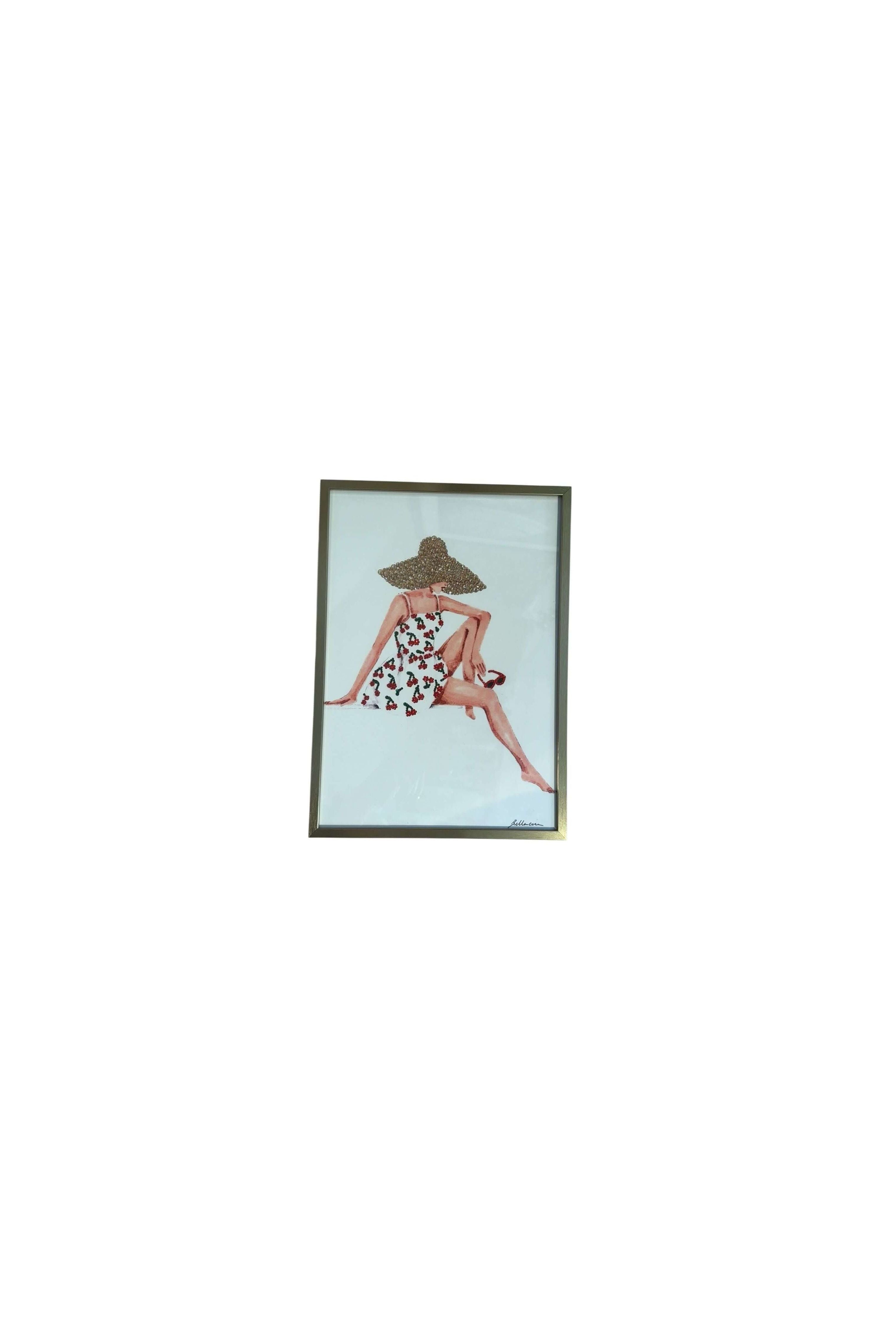 Encadré 21x30 cm avec une illustration artistique d'une femme en robe à motifs cœur et chapeau.