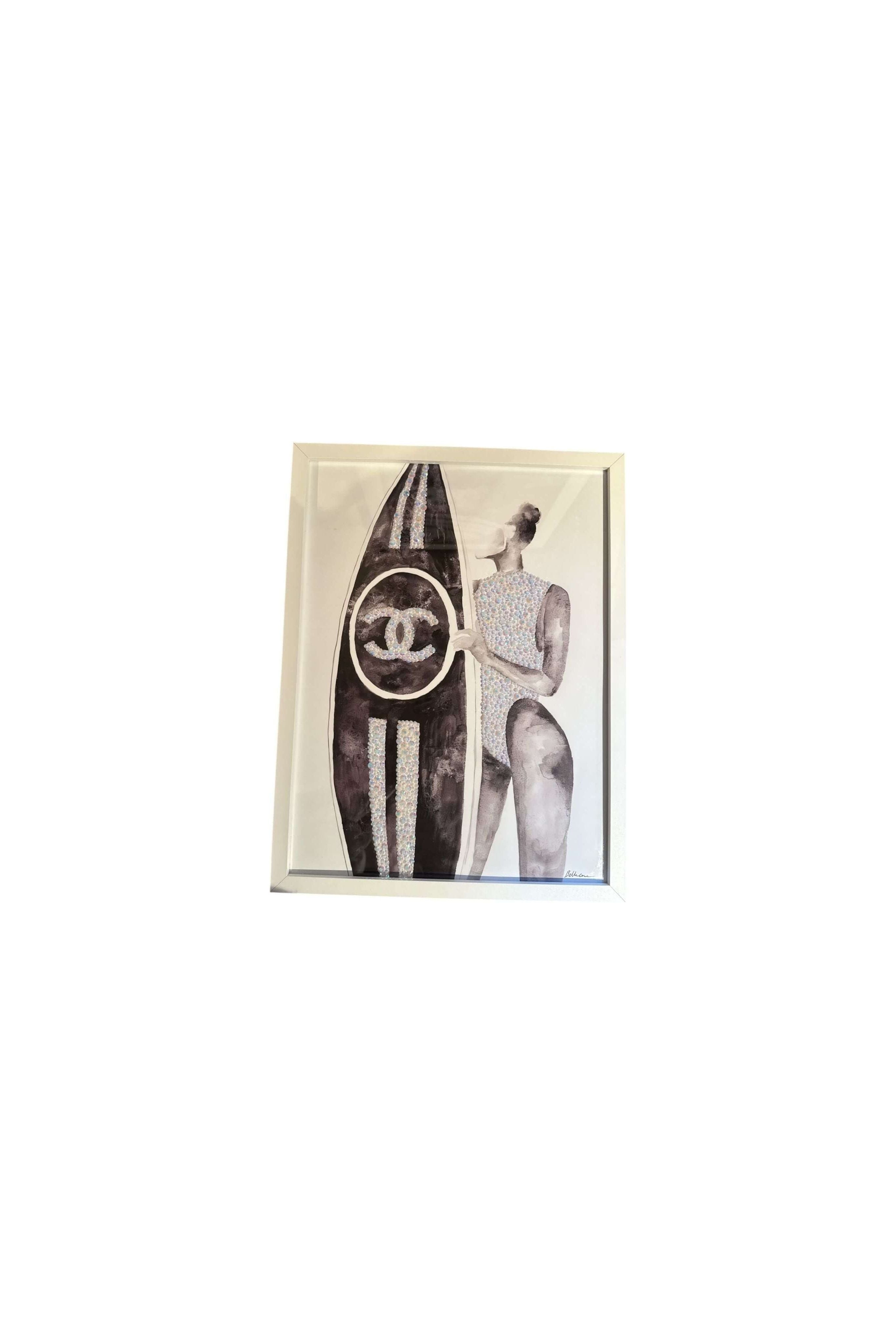 Art print of a stylish woman with a Chanel surfboard, showcasing a fashionable and chic beach aesthetic.