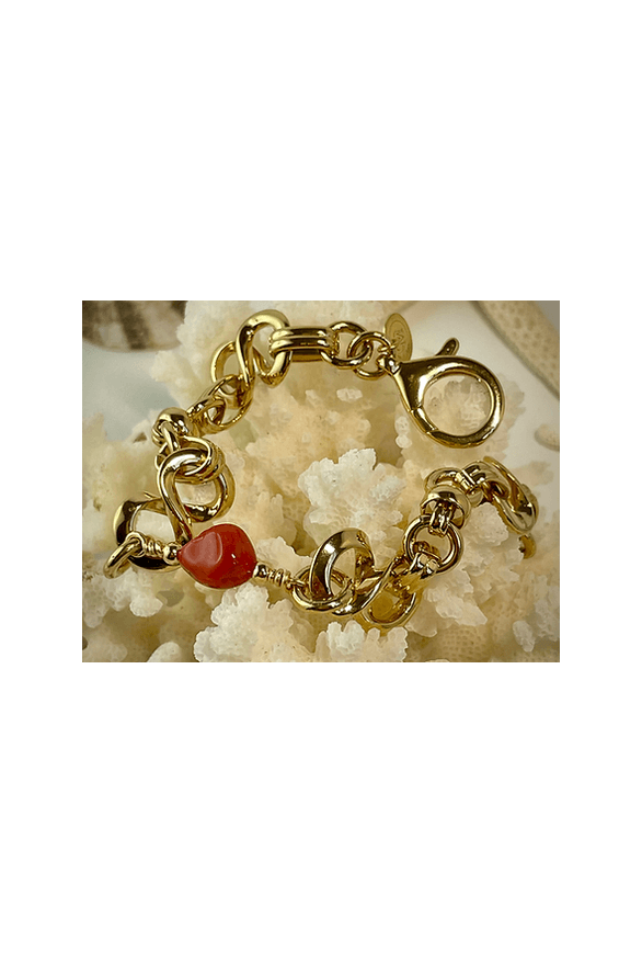 Bracelet Créazione with gold links and Mediterranean red coral, showcasing superior craftsmanship and unique design.