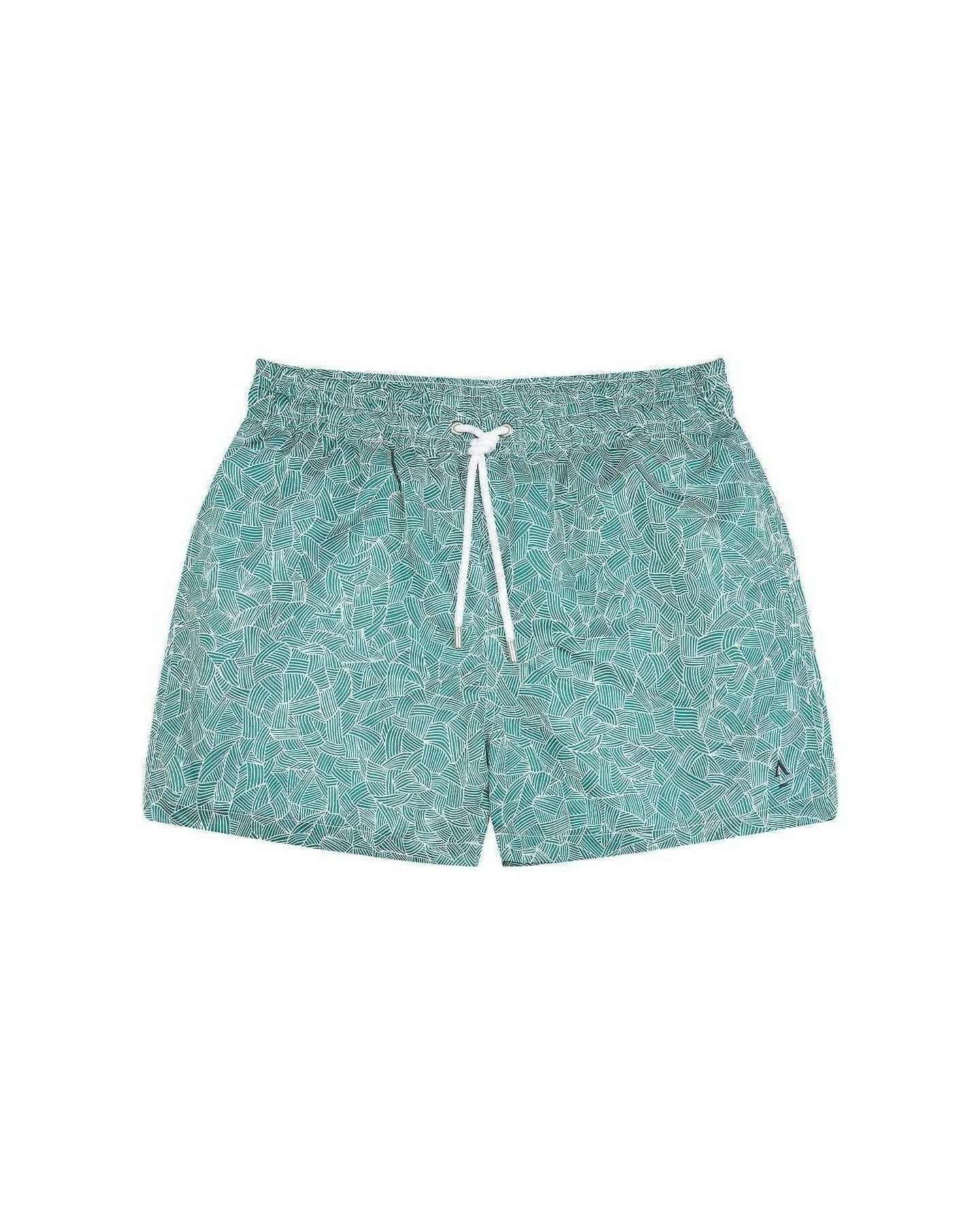 Short de bain Reflets en polyester recyclé, coupe mi-cuisses, poches latérales, couleur turquoise avec motif abstract.