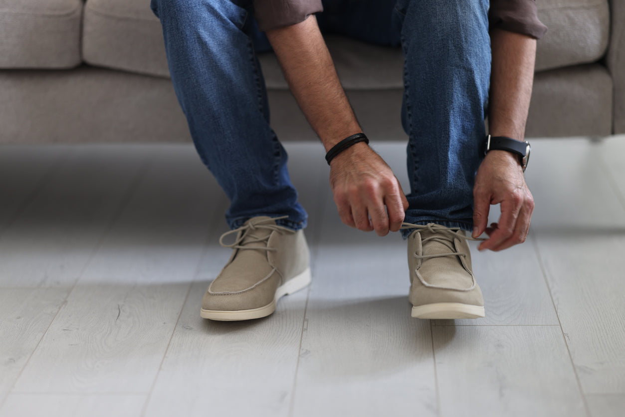 chaussures casual sportswear homme : baskets vintage, boots workwear, sneakers toile. Style urbain robuste.