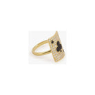 Gold ring featuring a card design with a clover motif, adorned with sparkling gemstones.