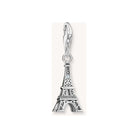 Charm pendant of the Eiffel Tower in recycled silver with a white zirconia, capturing vintage elegance.