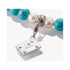 Pendentif charm argent 'I love Music' avec perles turquoise et blanches, design musical élégant et écologique.