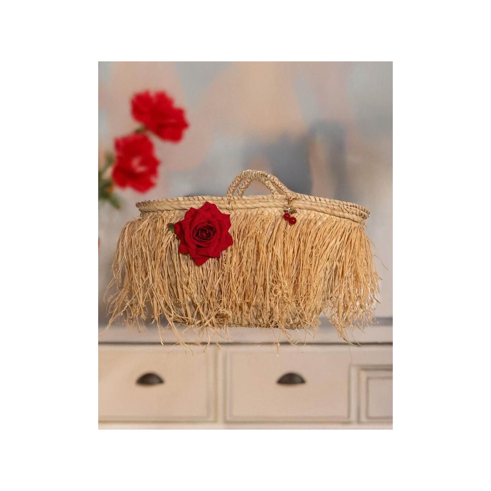 Elegant fringe basket bag with red rose, perfect for summer outings and city days, by Emi S.