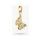 Pendentif charm papillon plaqué or 18k avec émail blanc scintillant, design délicat et fin découpage.