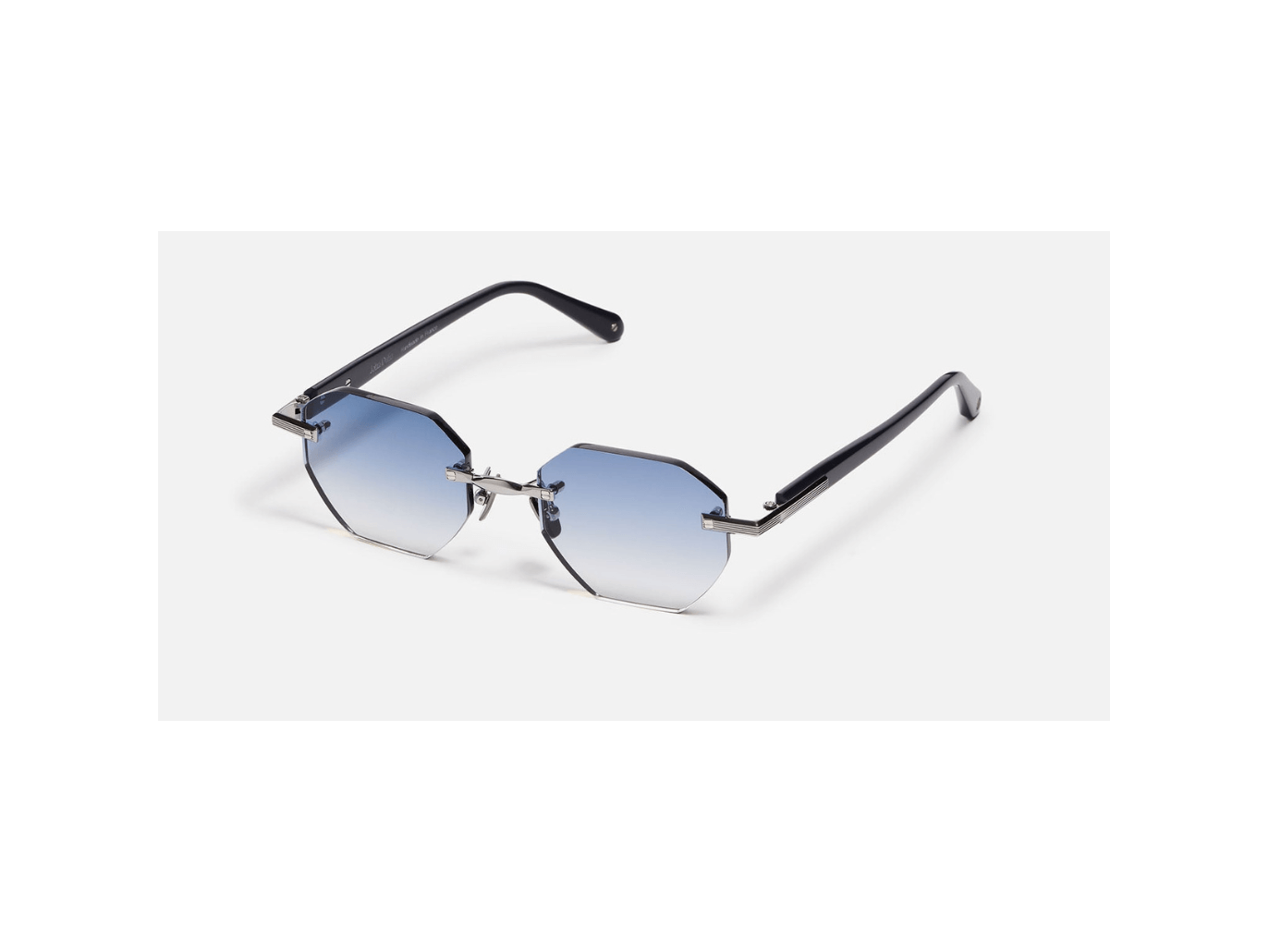 Lunettes de soleil Timothy C522 en métal avec verres dégradés et design contemporain élégant.