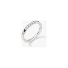 Alliance onirique en or blanc 18cts ornée de diamants, motif damier noir et blanc évoquant les astres.
