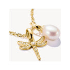 Pendentif charm libellule plaqué or avec pierres blanches et perle, élégant bijou nature.