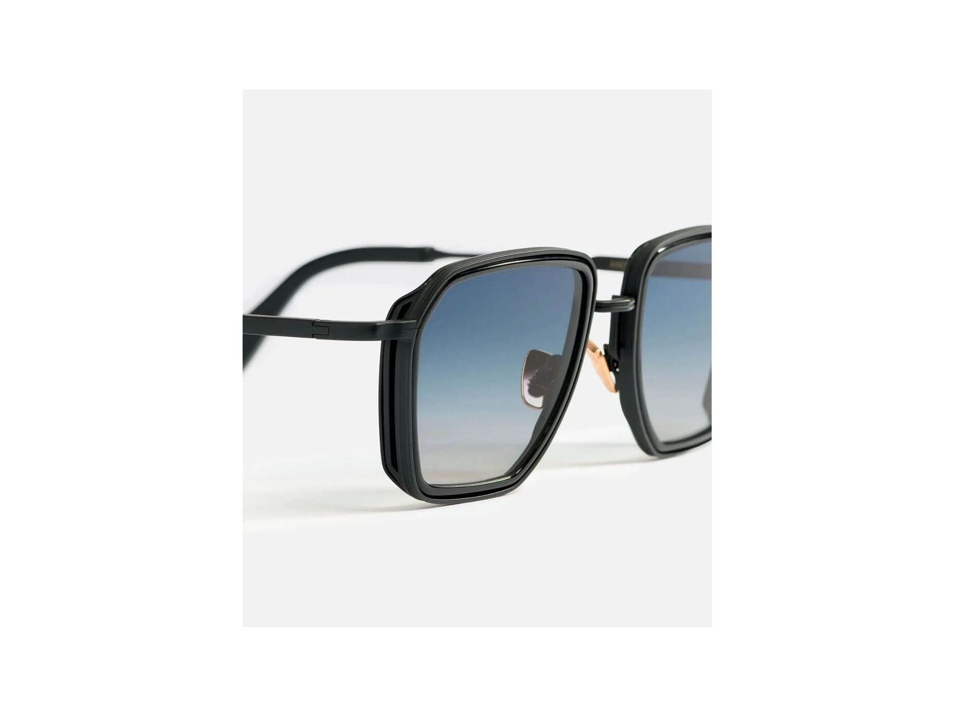 Stylish André 2 sunglasses, featuring a sleek square frame and gradient lenses, perfect for summer outings.