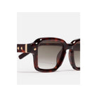 Dark brown tortoise sunglasses with rectangular frame and decorative studs by John Dalia, Project 07 series.