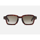 Lunettes de soleil unisexe en acétate tortoise, modèle Project 07, style rectangulaire avec charnières signature.