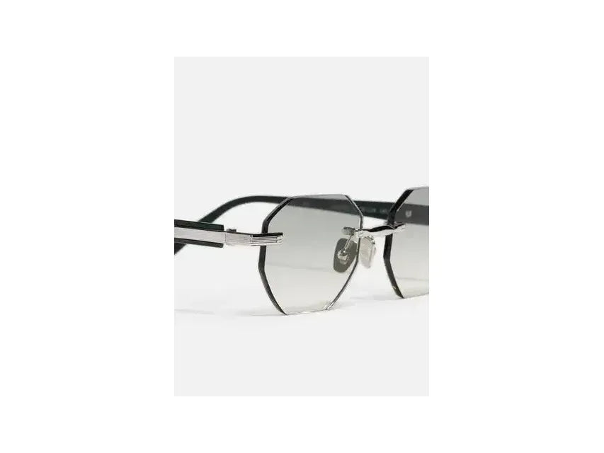 Lunettes de soleil Timothy C545 en platine plaqué, design octogonal élégant et moderne, parfaites pour un style raffiné.