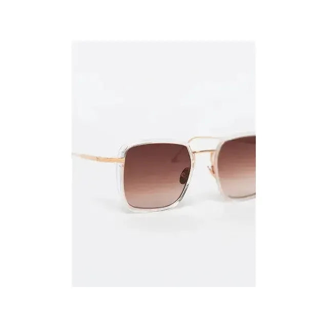 Lunettes de soleil Whitney C186 en monture Crystal rose gold avec verres dégradés marron.