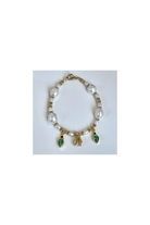 Bracelet Jardin featuring pearls, green apatite, and onyx, with a delicate 24-carat gold flower charm.