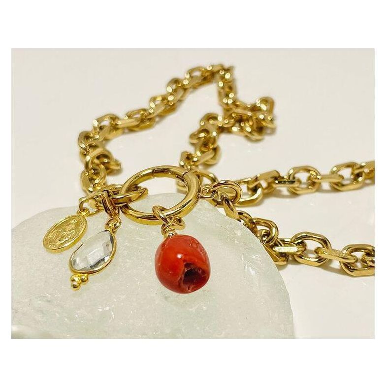 Collier Madone bracelet featuring Mediterranean red coral and gold links, showcasing elegance and craftsmanship.